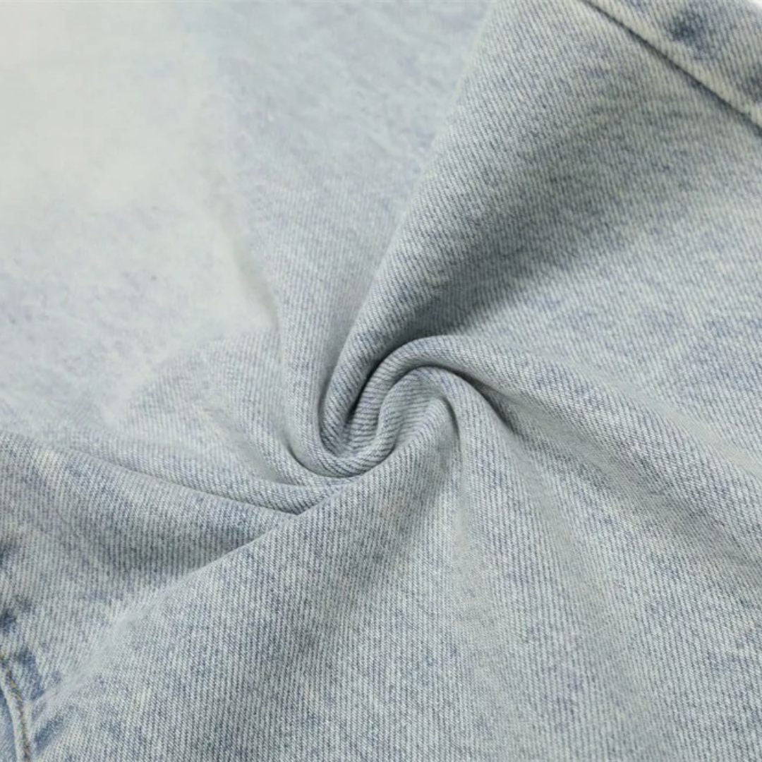 Washed Blue Wide-Leg Denim Jeans with Distressed Finish